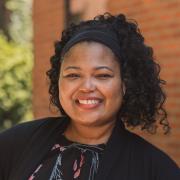 headshot of adrienne wells