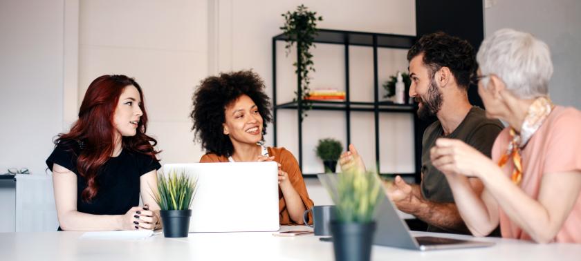 multi generational work employees office iStock